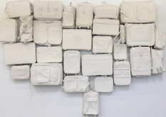 Longhui Zhang, Where to Go, 2014, luggage with paint, found objects